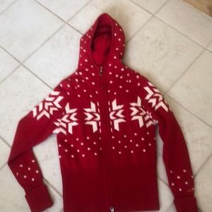 Kjus red lambs wool sweater.